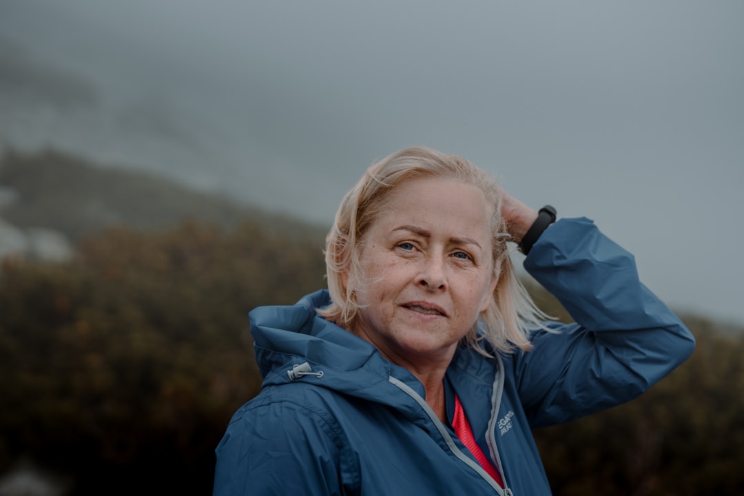Confident mature woman outdoors representing healthy aging and everyday wellness